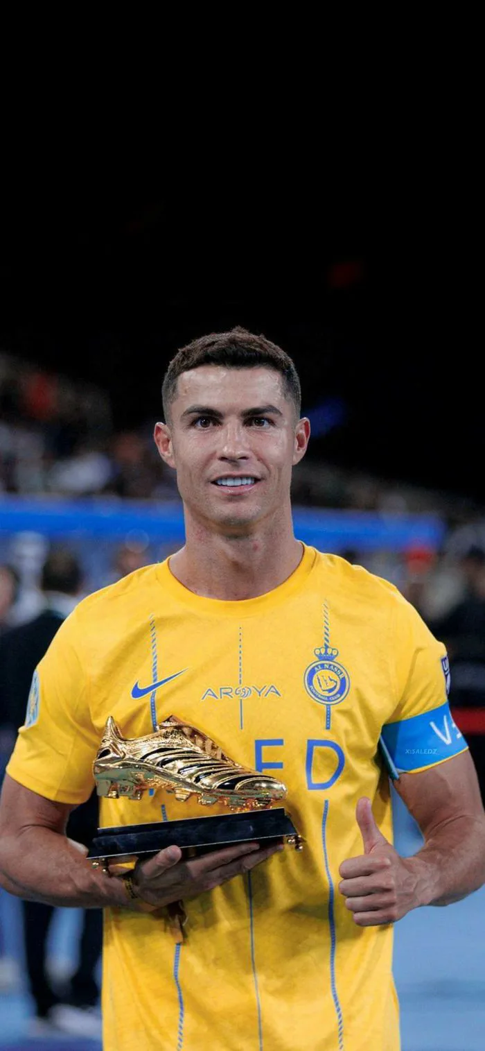Cristiano Ronaldo with first Al-Nassr Trophy Wallpaper HD