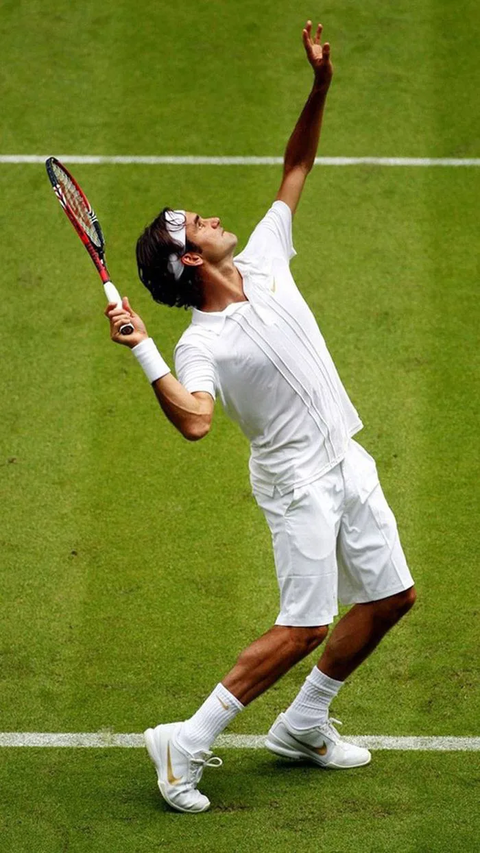 Download Tennis Player Roger Federer Phone Wallpaper | Wallpapers.com